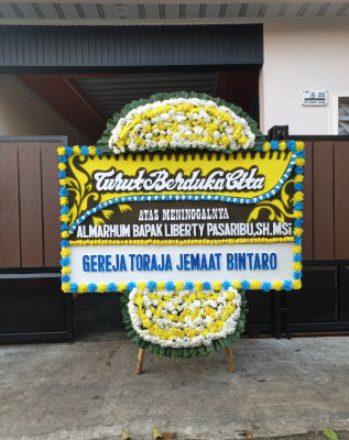 Papan Bunga Duka di Sungai Pelunggut