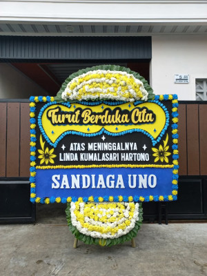 Papan Bunga Duka di Sungai Pelunggut